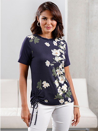 Woman wearing a Floral Ruched Top.
