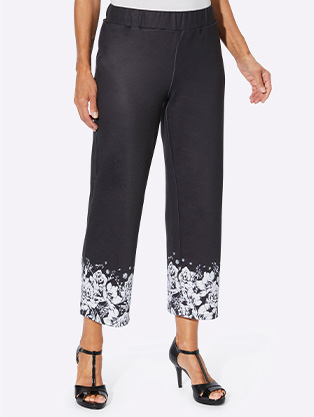 Woman wearing Floral Trim Capri Pants.