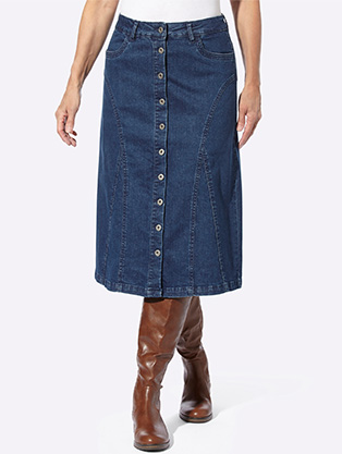 Woman wearing denim button up skirt.