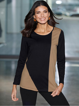 Woman wearing a Long Sleeve Color Block Shirt.