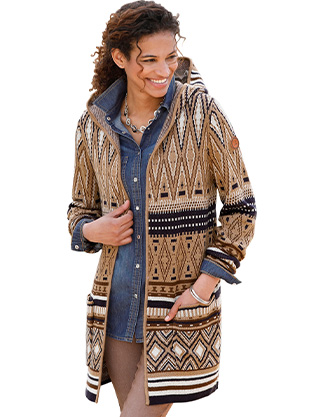 Woman wearing a printed long hooded cardigan.