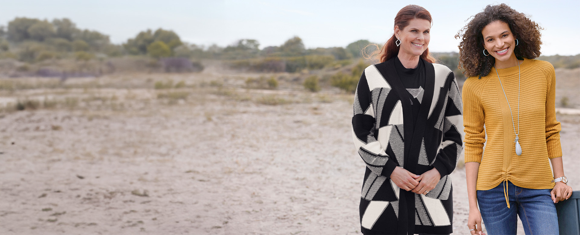 Woman wearing a printed knit cardigan.